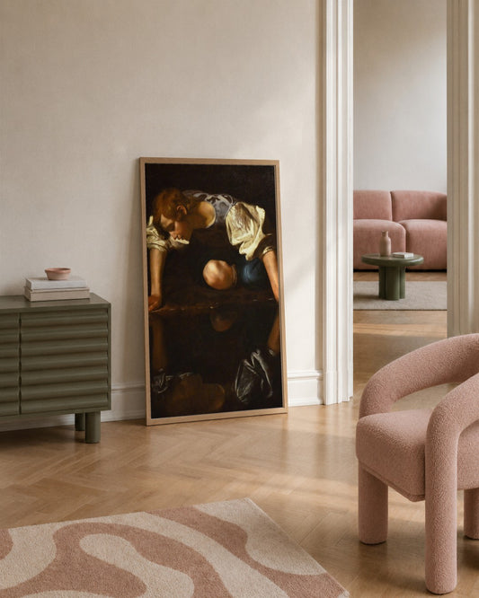 Caravaggio - Narcissus - framed print in a styled room