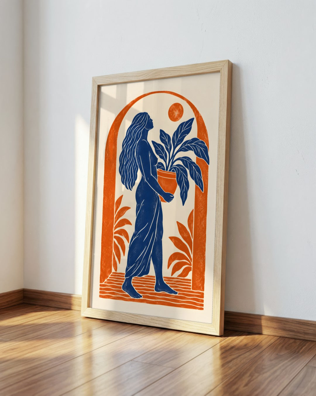 Yavr Johanssen - Linocut Woman with Potted Plant - framed print in a styled room