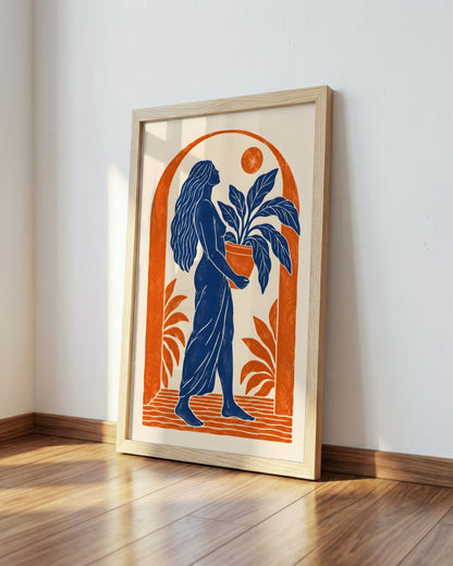 Yavr Johanssen - Linocut Woman with Potted Plant - framed print in a styled room