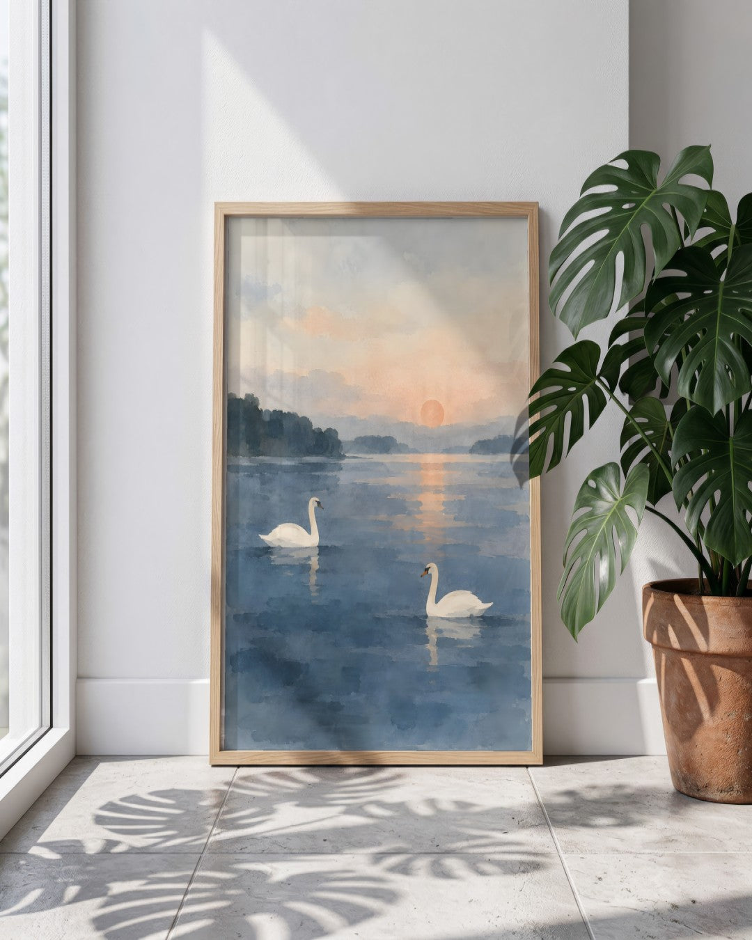 Cengiz Curtis - Dawn Swans on a Misty Lake - framed print in a styled room