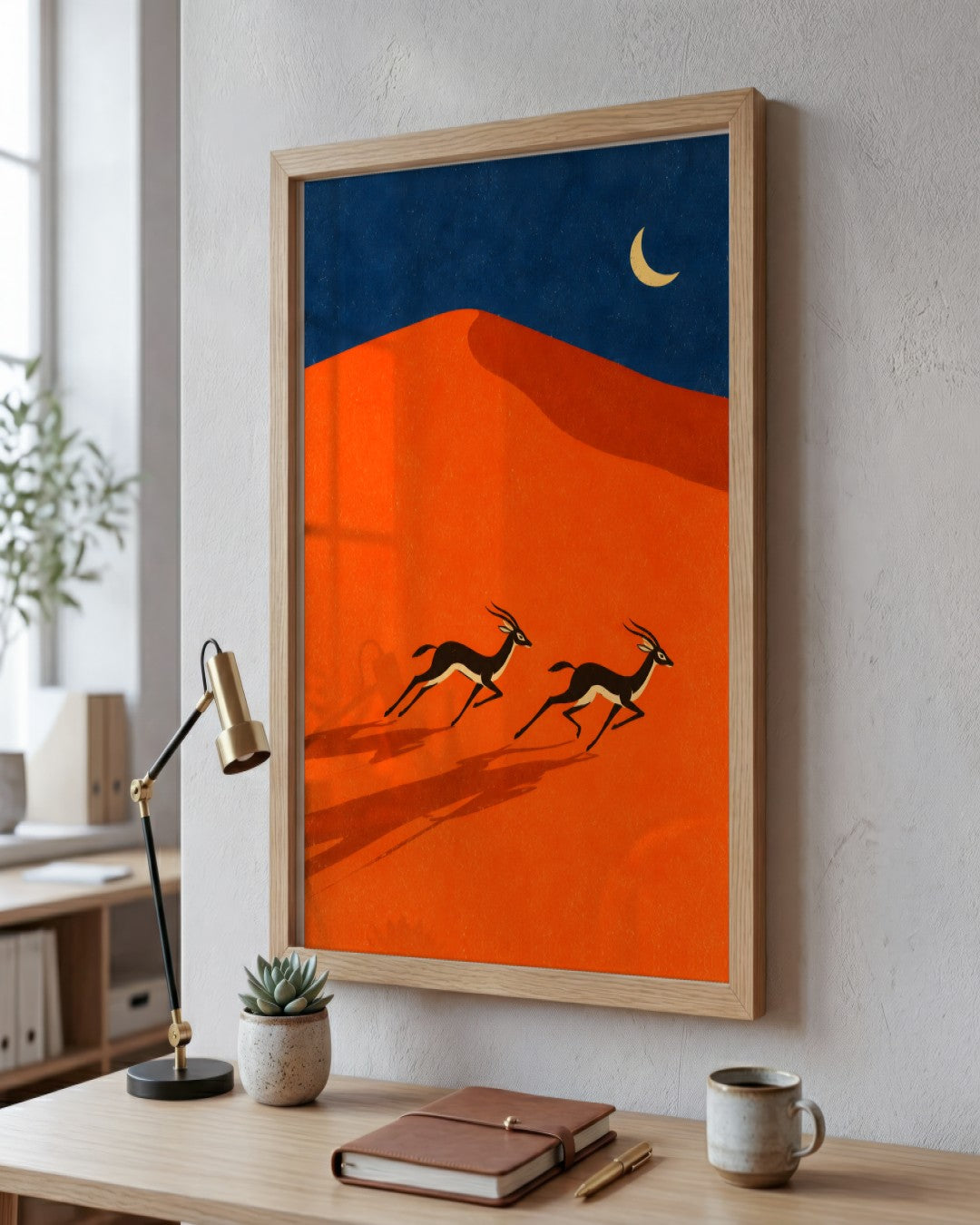 Elise Savoy - Gazelles in Desert - framed print in a styled room