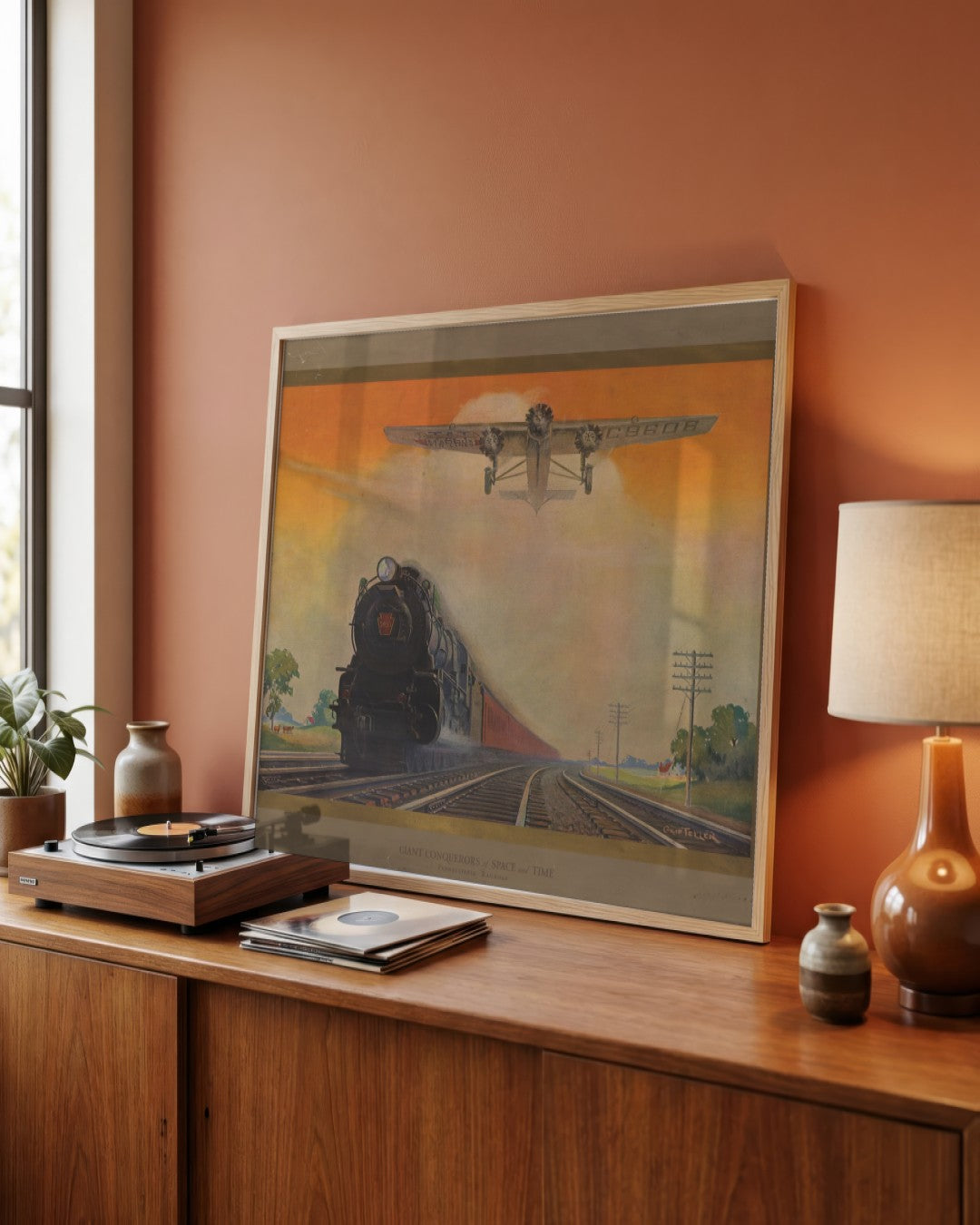 Pennsylvania Railroad - Giant Conquerors of Space and Time (1931) - framed print in a styled room