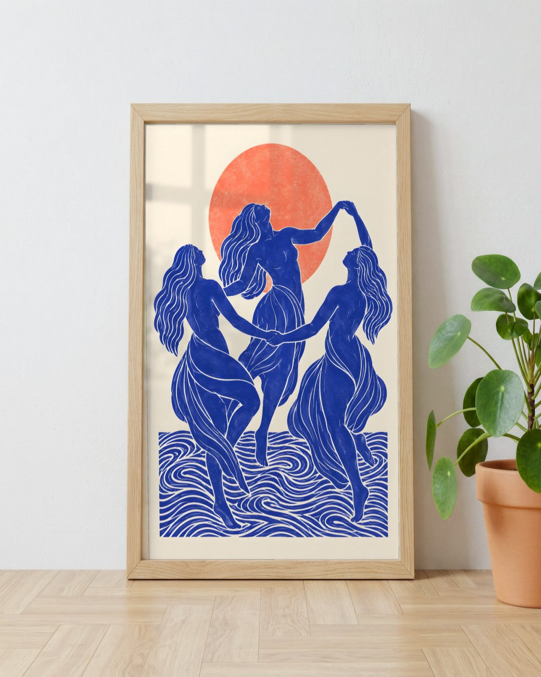 Yavr Johanssen - Indigo Dance Beneath the Coral Sun - framed print in a styled room