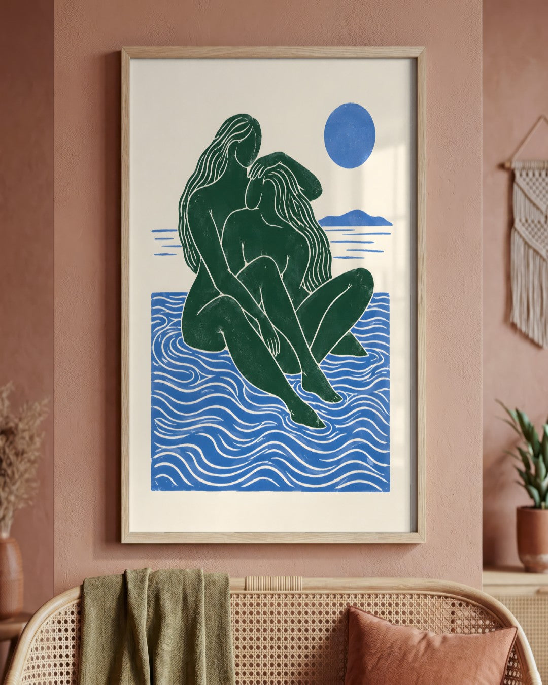 Yavr Johanssen - Entwined Swimmers in Blue Waters - framed print in a styled room