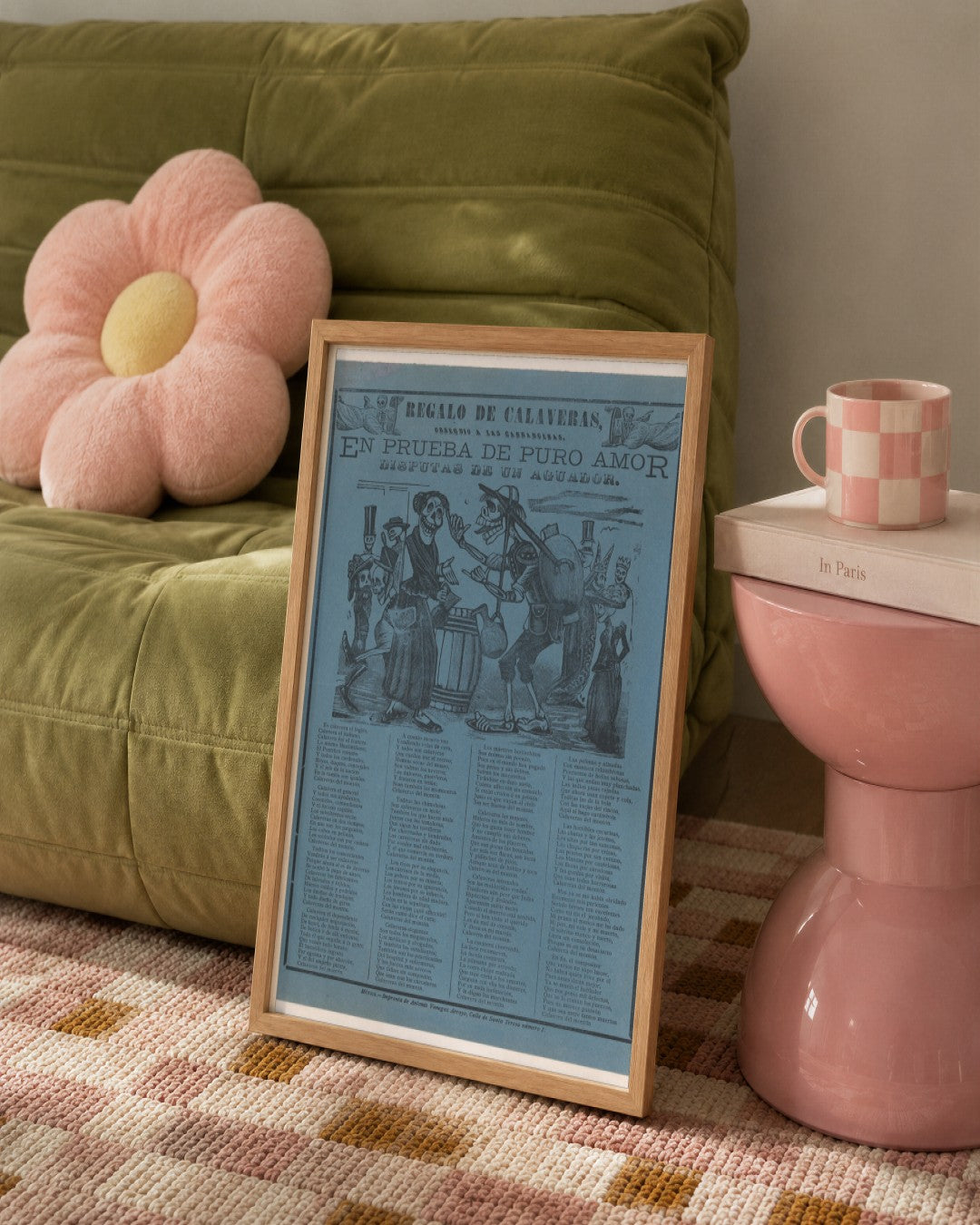 José Guadalupe Posada - In proof of true love, a watercarrier skeleton arguing with a woman (Posada); two skeleton angels in upper corners (Manilla) - framed print in a styled room