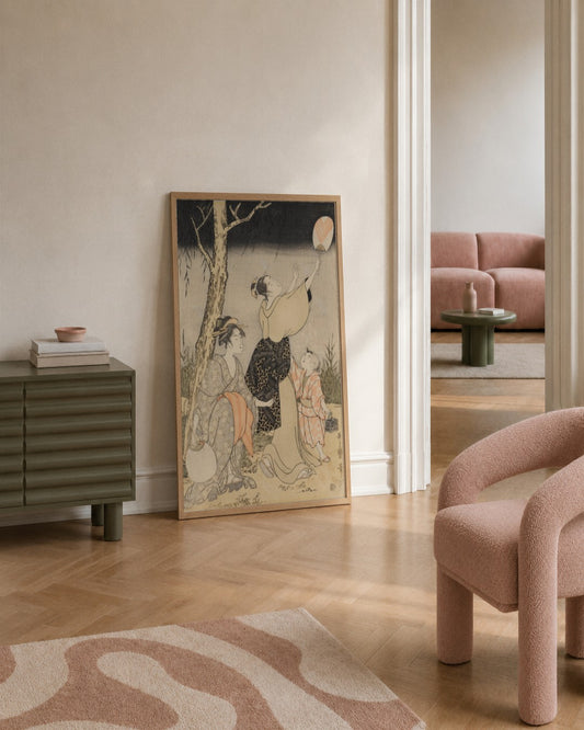 Kitagawa Utamaro - Catching Fireflies Beneath a Willow Tree (left) - framed print in a styled room