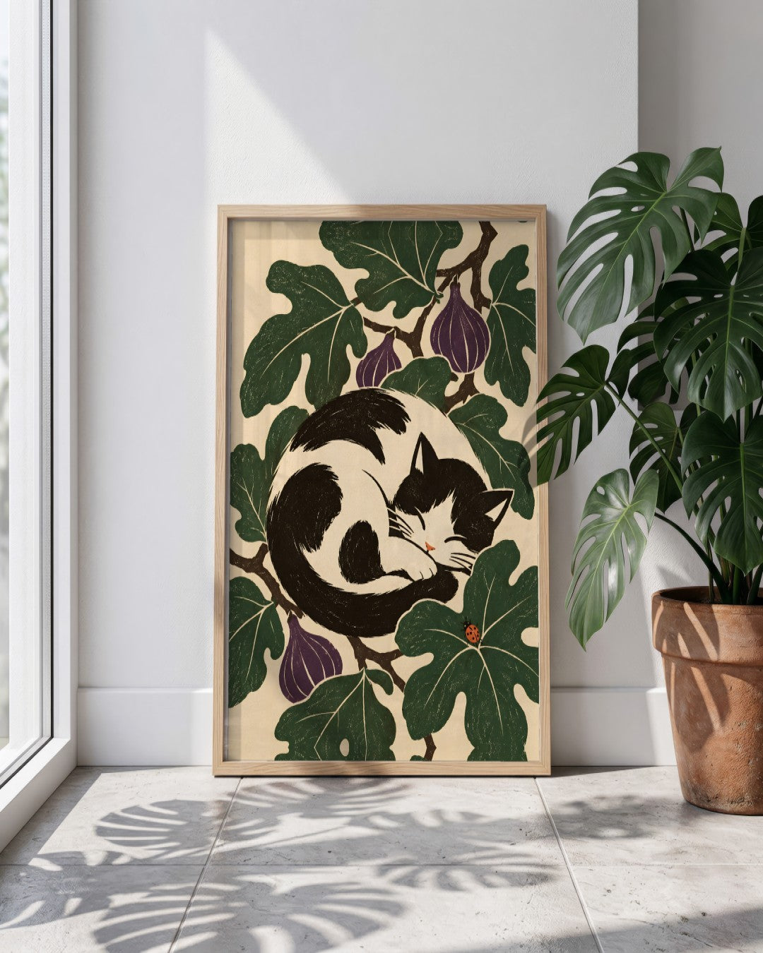 Elise Savoy - Sleeping Cat Fig Leaves - framed print in a styled room