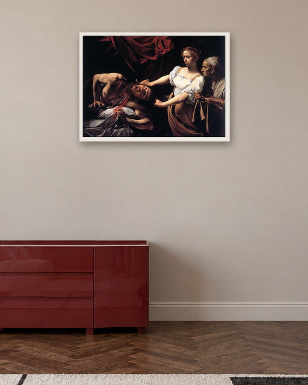 Caravaggio - Judith Beheading Holofernes - white frame in a room