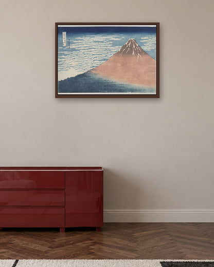 Katsushika Hokusai - South Wind, Clear Sky, from Thirty-Six Views of Mount Fuji - dark oak frame in a room