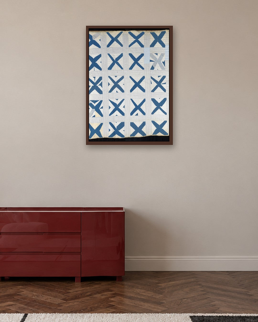 Untitled (Repeating X) - dark oak frame in a room